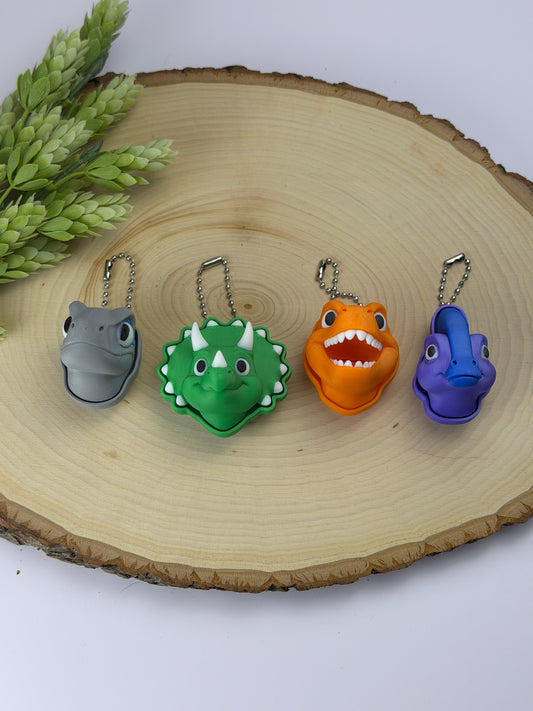 Dino head clickers