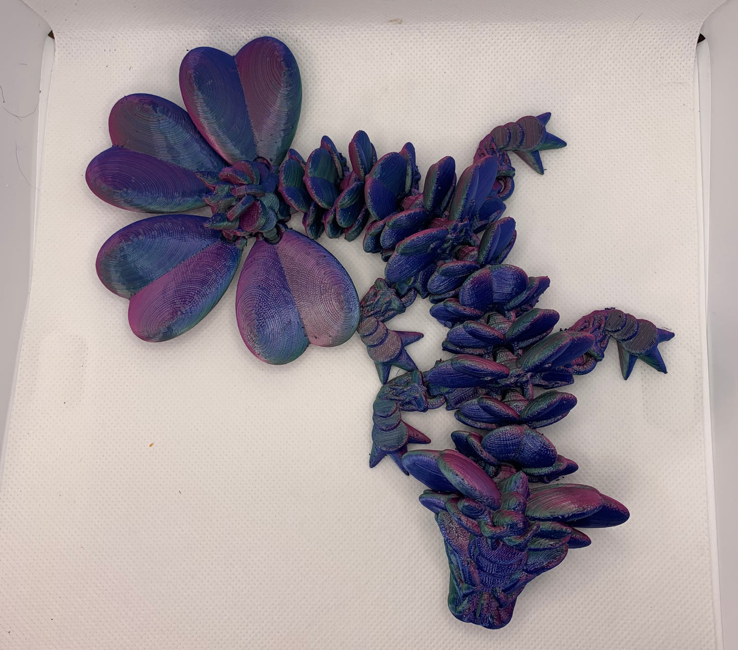 Articulating clover dragon