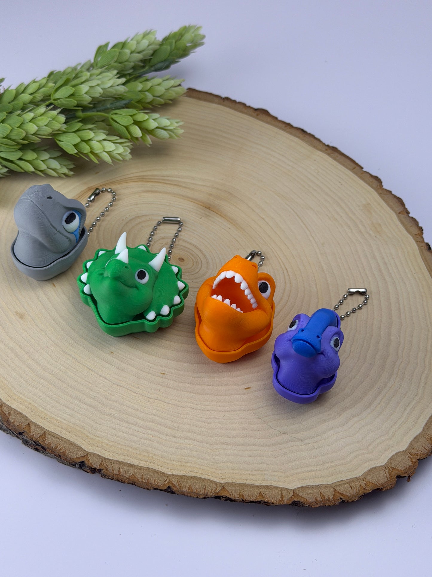 Dino head clickers