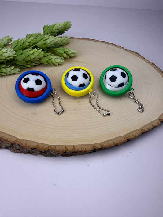 Soccer ball spinner