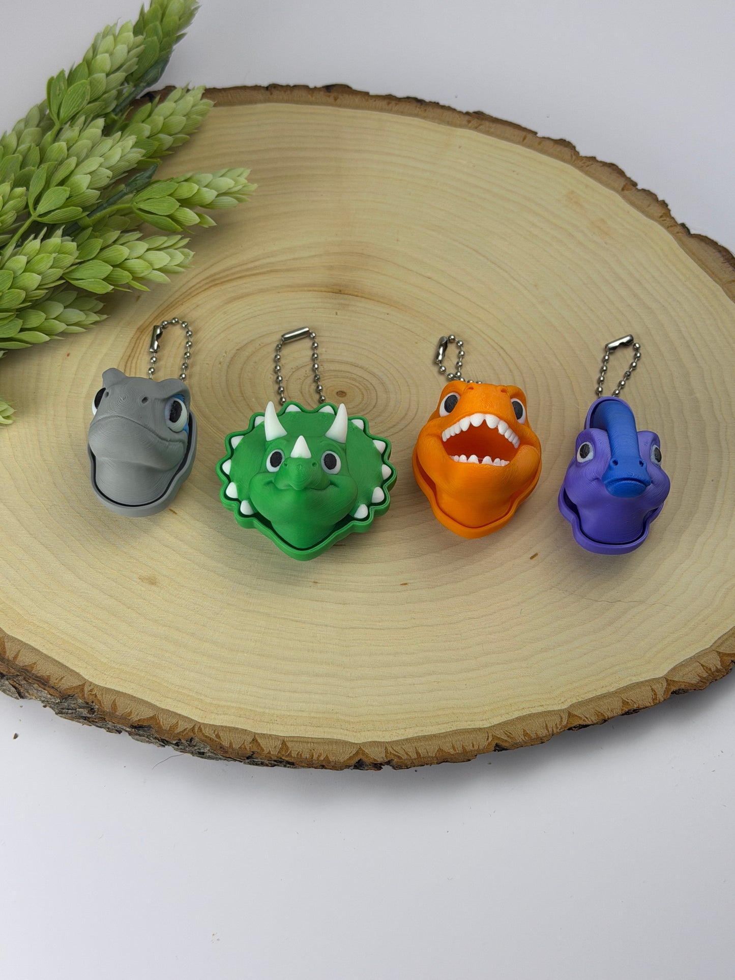 Dino head clickers